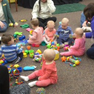 babies playing with toys